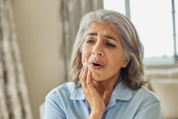 Woman with tooth pain